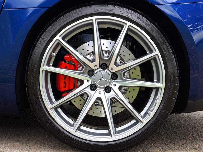 A close-up of a silver alloy wheel